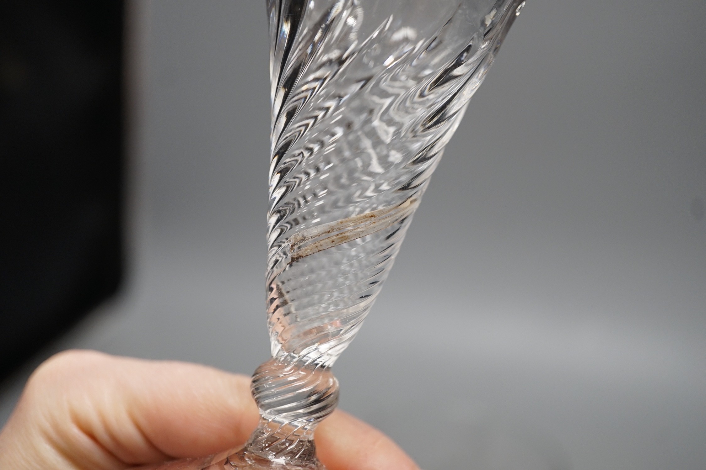 Two wrythen ale flutes, 18th century and a facet stem ‘OXO’ glass rummer, tallest 15cms high